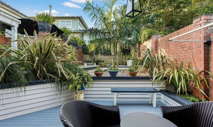 Epsom House | Inviting Flora and Fauna Unit with Garden & Deck Access
