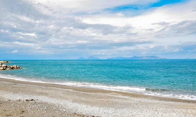 San Giorgio Apartment | Inviting 2-Bedroom Getaway in Gioiosa Marea with Ocean View