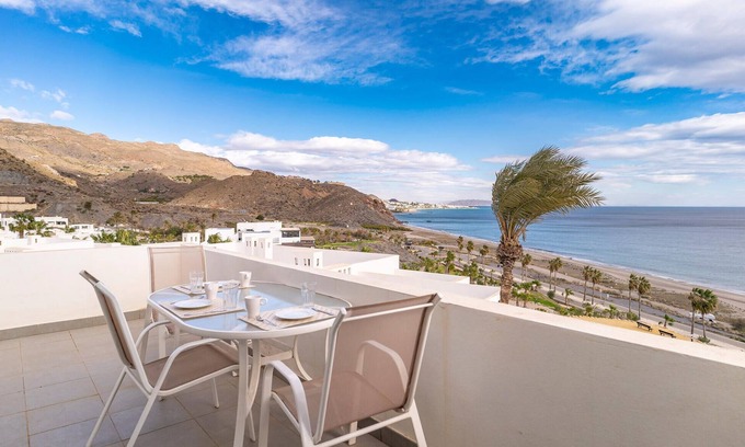 Playa Macenas Apartment | Enjoy Breathtaking Views at Our Family-Friendly Apartment