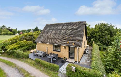 Langeland Municipality House | Charming Home in Rudkbing with Kitchen for Your Family