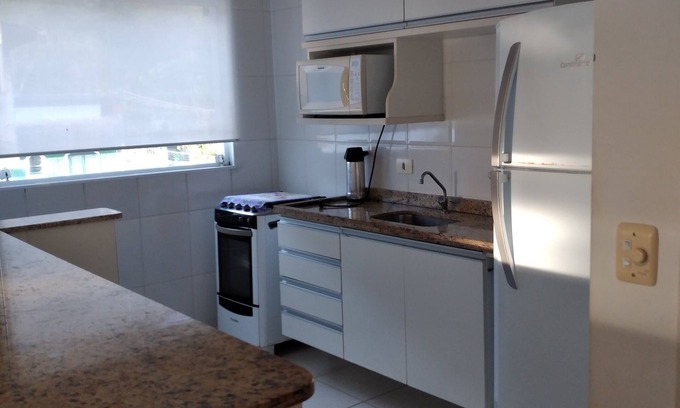 Praia da Enseada Apartment | Cozy 2 Bedroom Apartment with Ocean View at Enseada Beach