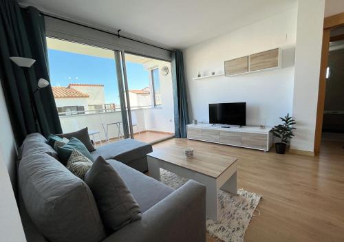 Llanca Apartment | Fresh 2-Bedroom Apartment Steps from the Beach with Ocean View