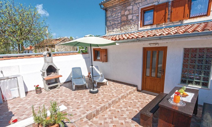 Rakalj House | Tranquil Retreat in Krnica with Oceanfront Views