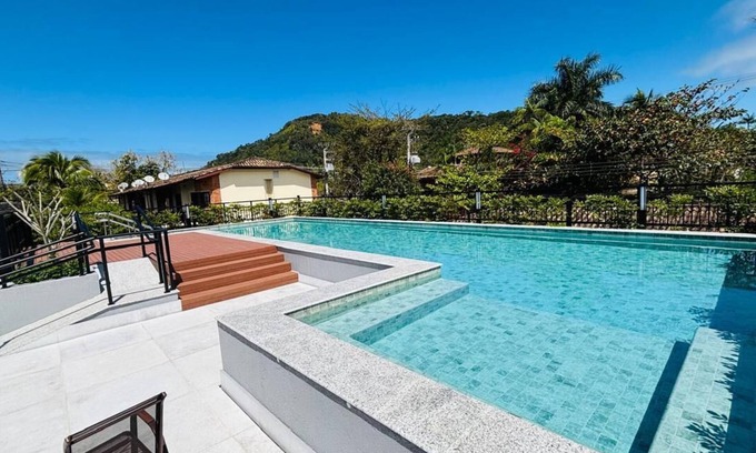 Sao Sebastiao Apartment | Stylish 2-Bedroom Suite Steps from Praia da Baleia