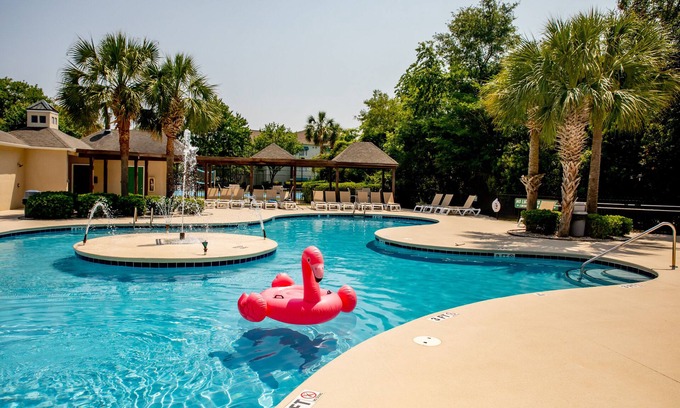 Vaught Apartment | Pet-Friendly 2 BR Condo with Pool & Golf Cart Access