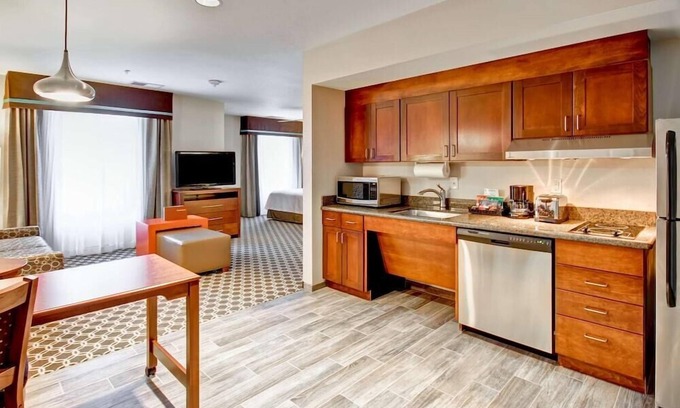Greeley Apartment | Convenient 2 Connecting Suites with Pool and Kitchen Access