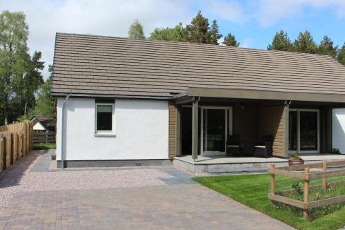 Coylumbridge House | Discover 2 Dellmhor Cottages: Pet Friendly with Hot Tub