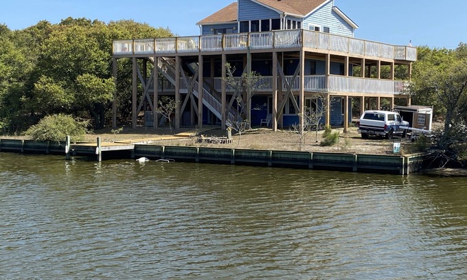 Carova Beach House | Pet-Friendly Waterfront Getaway with Hot Tub & Boat Dock