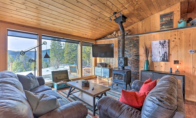 Saint Mary's Cabin | Relaxing St. Mary's Retreat: Hot Tub, Sauna & Mountain Views