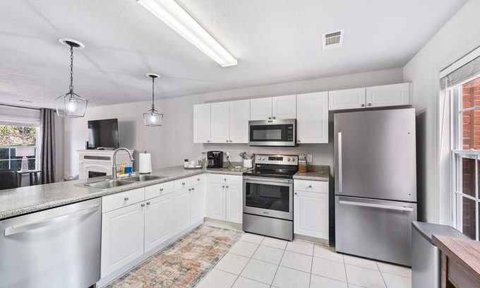 Auburn Condo | Convenient Stay: 2 Miles from Stadium with Pool & Family Perks