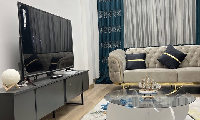 Esenyurt Apartment | Convenient Hotel Steps from Shopping and Metro with City Views