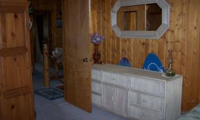 Condon House | Enchanting Log Home with Spa and River Views