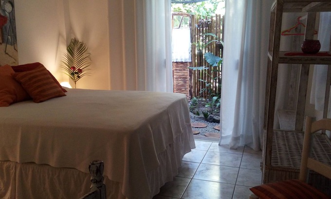 Arraial d'Ajuda House | Cozy Oceanfront Suites with Pool and Garden Oasis
