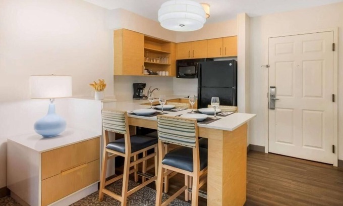 Arrowood Hotel | 2 Suites - Relax in Convenience Close to NASCAR Hall of Fame and Carowinds