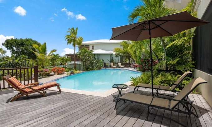Leeward Settlement House | Exclusive 10% Off: Poolside Oasis Near Grace Bay