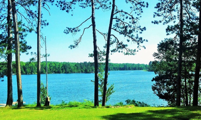 Grand Rapids Cabin | 2015 Built Lakeshore Cabin with 220 of shoreline, sandy beach on 8 private acres