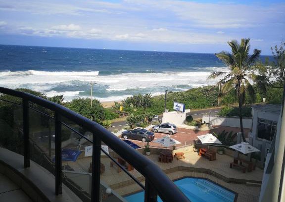 La Mercy Apartment | Inviting Oceanfront Retreat at 208 Coral Reef with Pool