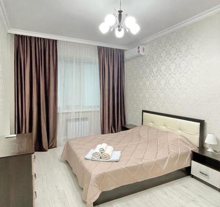 Atyrau Apartment | Inviting Sunlit Apartment with Breakfast & Family-Friendly Perks