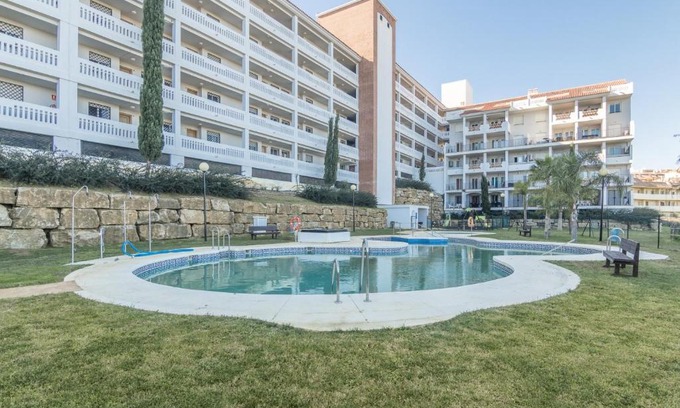 Puerto de la Duquesa Apartment | Inviting 2-Bedroom Retreat with Pool and Play Area