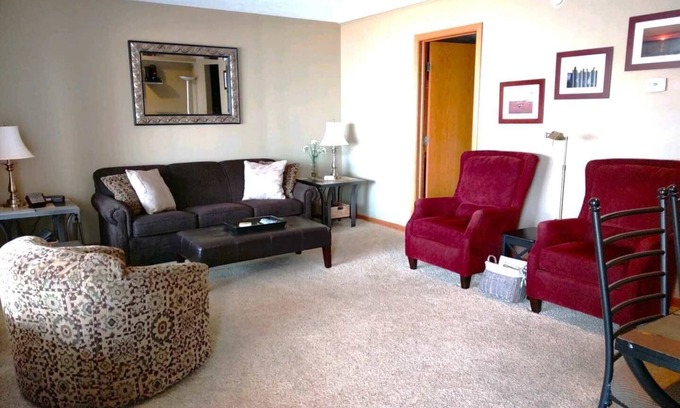 Elk Rapids Condo | Experience Elk Rapids Condo #23 with Pool and Lake Views