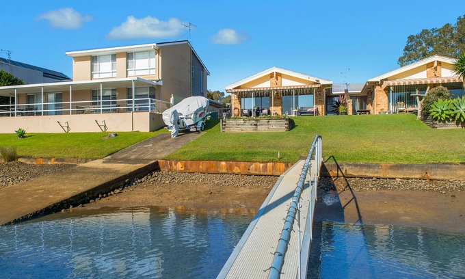Port Macquarie House | Serene Waterside Canal Home with Family-Friendly Amenities