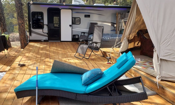 Hot Springs House | Exceptional 29ft Alpha Wolf RV & Sibley Tent Combo with Hot Tub