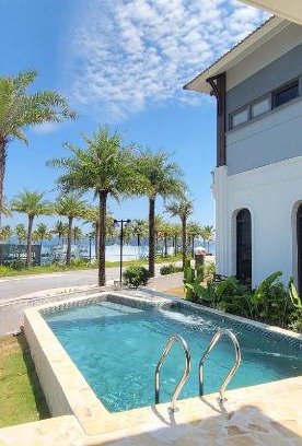 Van Don Villa | Sonasea Harbor Villa: Oceanfront Retreat with Private Beach