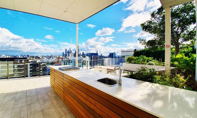 Newstead Apartment | Inviting 2BR Oasis with Pool, Rooftop & Gym Awaits You