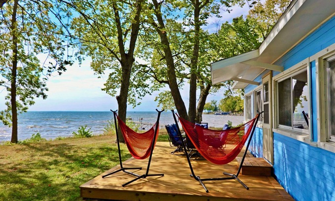 Isle Cabin | Experience Lakefront Bliss: 2BR Cabin with Boat Dock