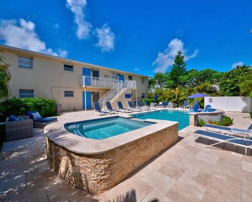 Singer Island Apartment | Beachside 2BR Oasis - Steps to Everything & Pet Friendly!