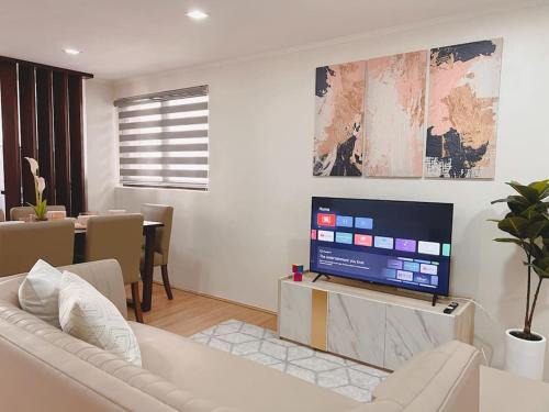 South Triangle Apartment | Family-Friendly 2BR Loft Steps from M Place, Rated Perfect