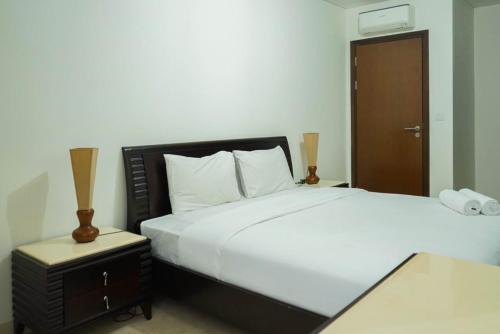 Pancoran Apartment | Modern 2BR Apartment with Pool at L'Avenue by Travelio