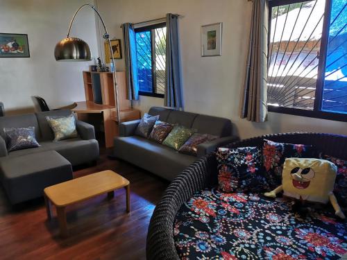 Dauin House | Beachfront 3-Bedroom Retreat at Glamping Dome Resort