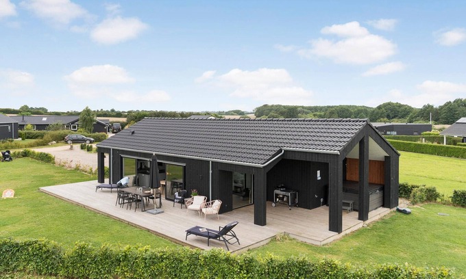Flovt Strand House | Inviting Vacation Home with Hot Tub & Ocean Views