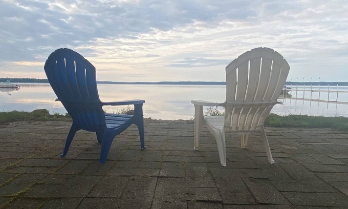 Levering Cabin | 3-bedroom Douglas Lake waterfront cabin in amazing Levering with WiFi, window AC