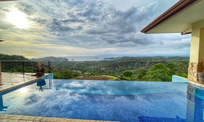 Coco House | Oceanfront 3-Bedroom Retreat with Infinity Pool & Spa