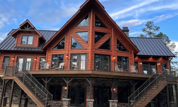Granite Falls Cabin | Idyllic Lakefront Log Cabin with Private Dock & Pool