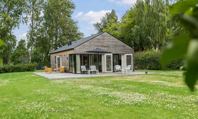 Hornsved House | Modern Wooden House with Family-Friendly Garden & Lake Views