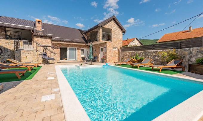 Municipality of Gracac Apartment | Inviting Family Retreat with Pool and Scenic Mountain Views
