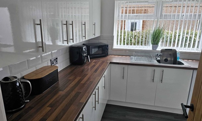 Rhyd-y-foel Cottage | Contemporary Retreat Steps from Castle & Town Attractions