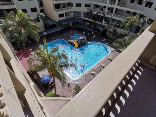 Pangkor Island Apartment | Cozy Pangkor Coral Bay Homestay with Oceanfront Pool