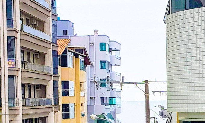 Itapema Apartment | Ocean View Haven: Balcony & BBQ with 9.6/10 Guest Rating