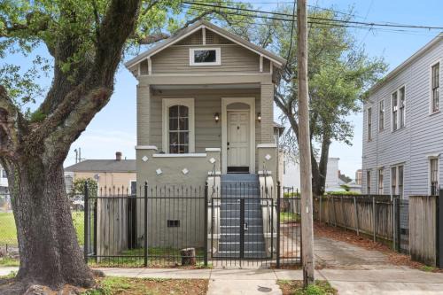 Faubourg Delassize House | Cozy 3BD Home Steps to Saint Charles with Gated Parking