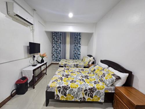 Butuan House | Cozy 3MC Guest House: Family-Friendly with Kitchen Access