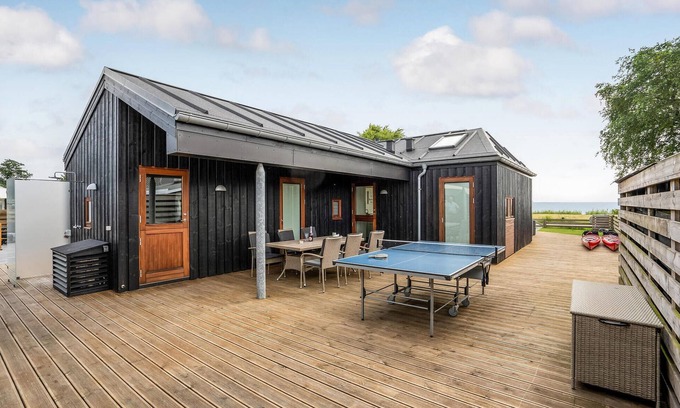 Grønninghoved Strand House | Oceanfront Vacation Home with Stunning Water Views