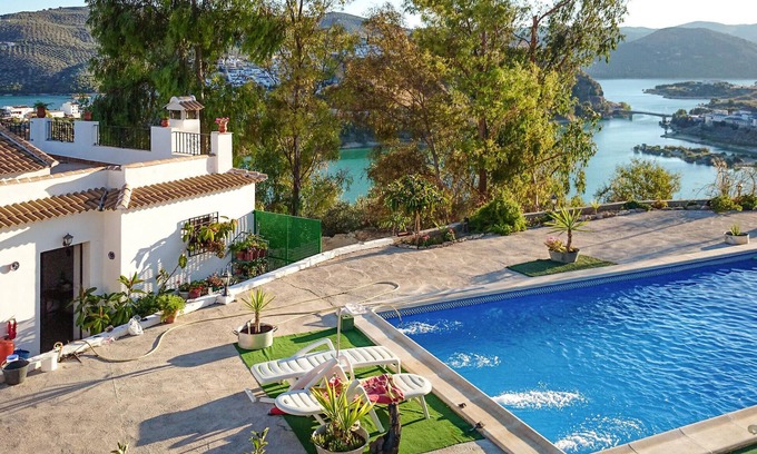 Iznajar House | Relaxing Lake View Getaway with Pool & Spa Amenities