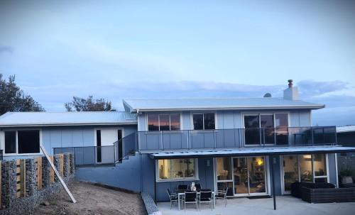 Waitarere Beach House | Oceanfront Escape at #40 At The Beach with Hot Tub