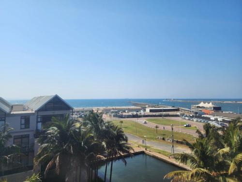 Durban Point Apartment | 403 Point Bay: Oceanfront Oasis with Unmatched Guest Ratings
