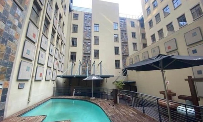 Downtown Johannesburg Apartment | Budget-Friendly 409 Mapungubwe Hotel with Pool Access