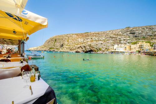 Xlendi Apartment | Idyllic Xlendi Central Apartment with Oceanfront Views